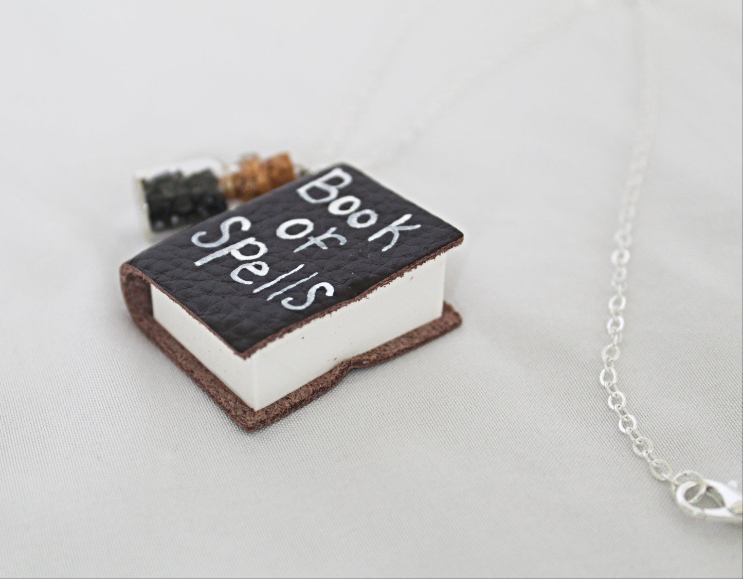 Book of Spells and Spell Jar Necklace