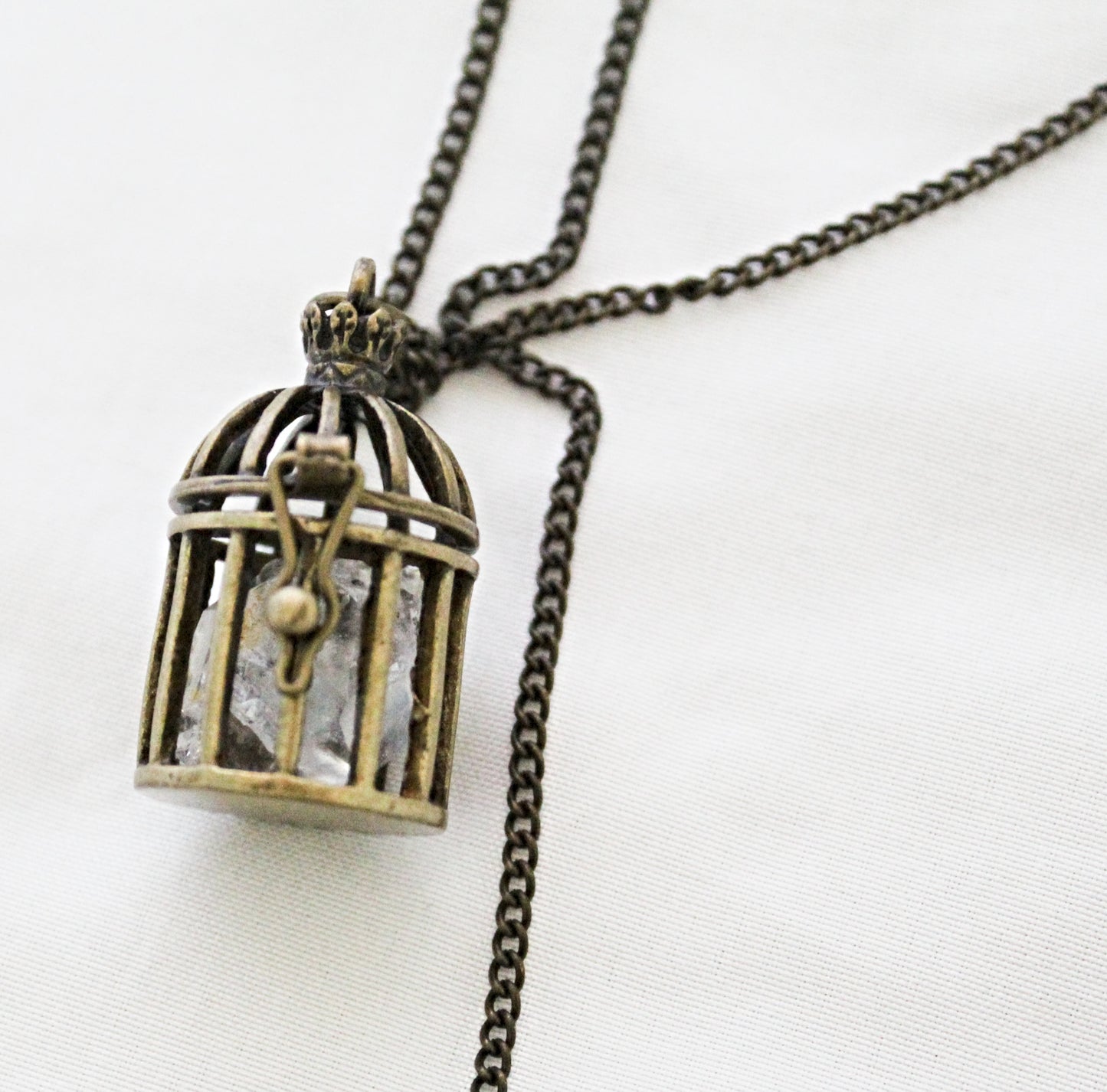 Small Birdcage Crystal Necklace featuring Clear Quartz Point
