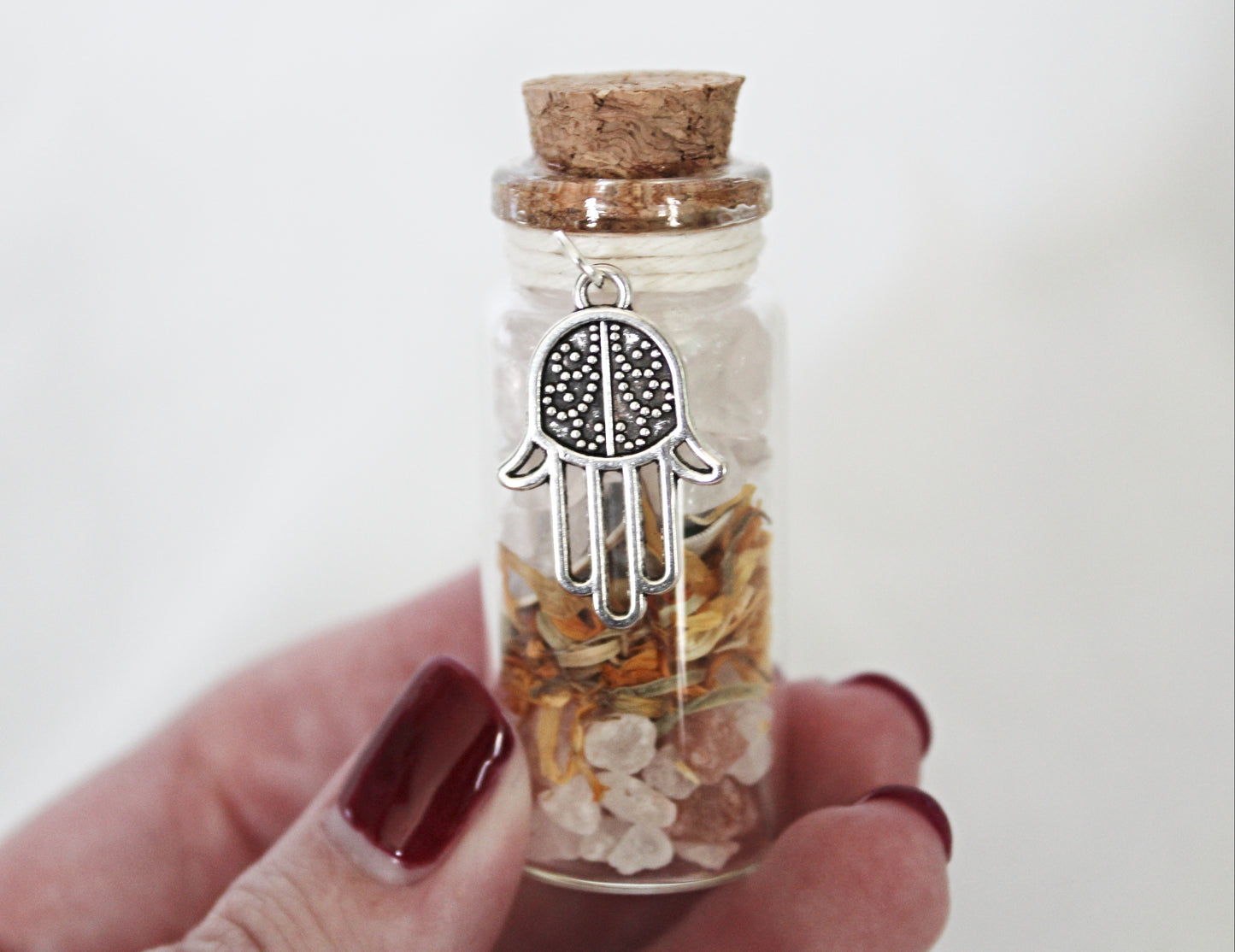 Spell Jar Featuring Seashells and Hamsa Charm