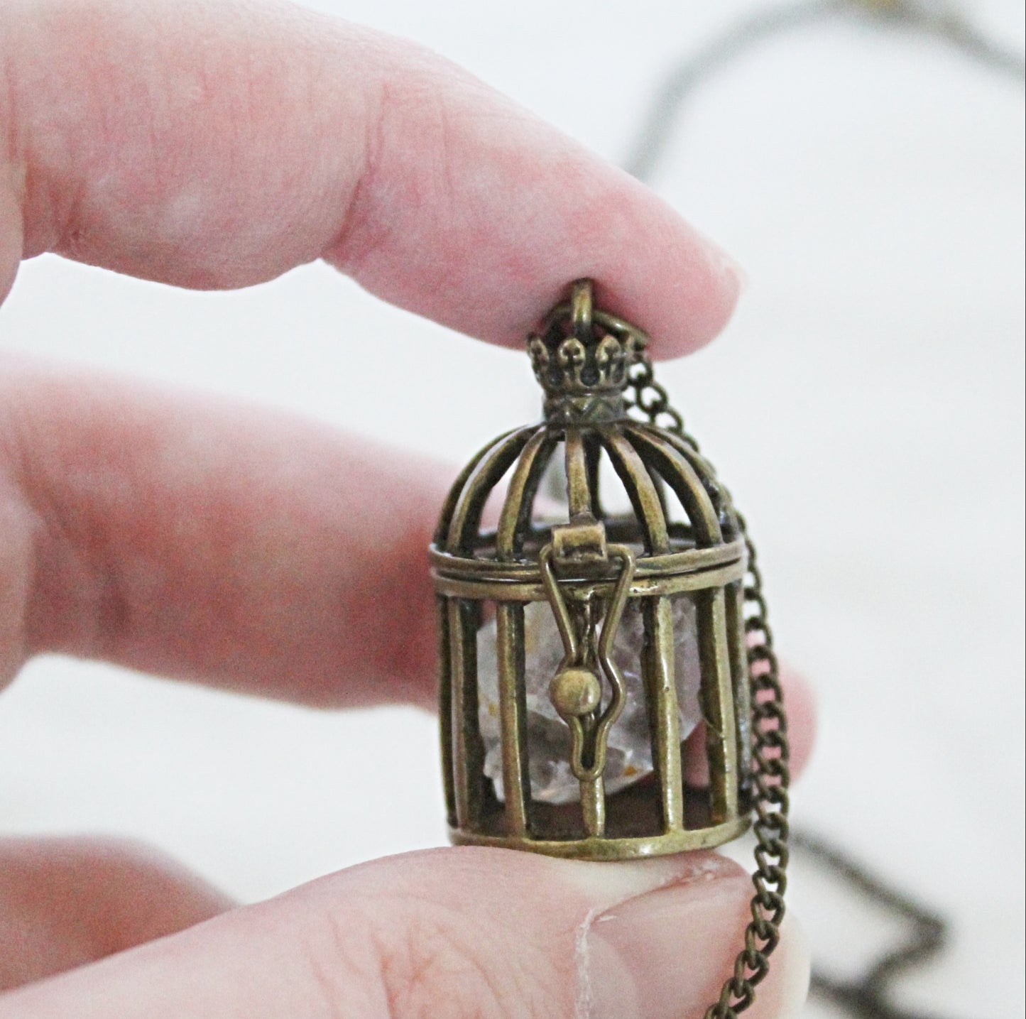 Small Birdcage Crystal Necklace featuring Clear Quartz Point