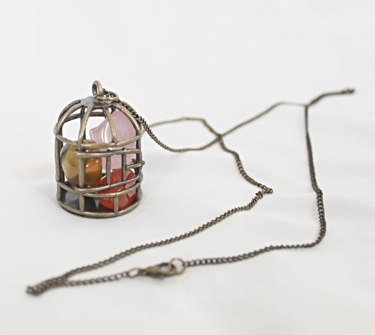 Birdcage Crystal Necklace featuring Mookaite, Rose Quartz, and Carnelian